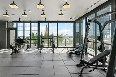 a gym with cardio equipment in a building at New 2-Bdrm Downtown Miami Apartment with Bay Vista in Miami
