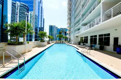 a swimming pool in the middle of a building at Beautiful Condo w Breathtaking Views! in Miami