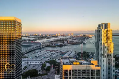 an aerial view of a harbor in a city with tall buildings at Lumiére Penthouse in Miami