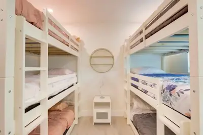 a room with four bunk beds with a mirror at Flamingo House with Cinema, Pool & Chill Area in Miami