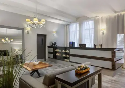 a living room with a couch and a table at Ocean Drive Suite in South Beach Family & Pet Friendly in Miami Beach