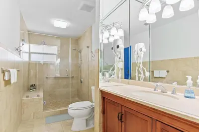 a bathroom with a toilet and a sink and a shower at Casa Santorini - Big Pool - Barbacoa - Fun and Relax in Miami