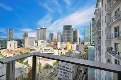 a view of a city skyline from a balcony at Charming 2 BR Downtown Miami 2106 Free Parking in Miami