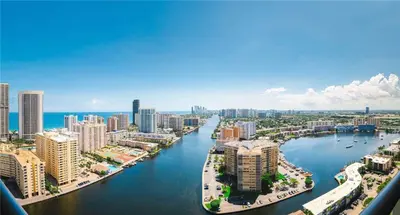 an aerial view of a city with a river and buildings at Lovely Studio with Amazing View gym and amenities in Hallandale Beach
