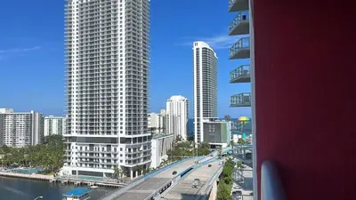 a view of a city with tall buildings and a freeway at Amazing Family Studio at Beachwalk on Hallandale in Hallandale Beach