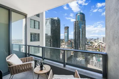 a balcony with a view of the city at NEW 28th Floor unit - Breathtaking Bay and Downtown Views in Miami