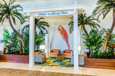 a tropical room with a parrot painted on the wall at Margaritaville Hollywood Beach Resort in Hollywood