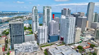 an aerial view of a city with tall buildings at 227-2212AM DOWNTOWN MIAMI STUDIO in Miami