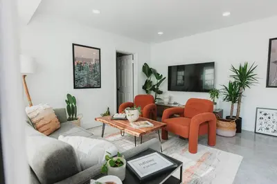 a living room with a couch and two chairs and a table at Miami Oasis - Unit A in Miami