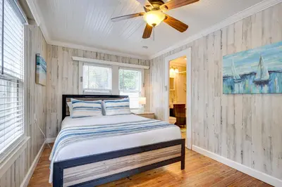 a bedroom with a bed and a ceiling fan at Shared Pool and Backyard Small and Cozy Guest House in Fort Lauderdale