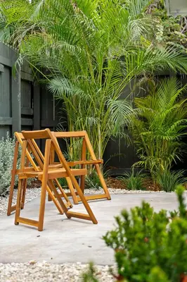 a wooden chair sitting on top of a patio at 921 Apartment 1 in Fort Lauderdale