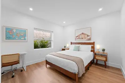 a bedroom with a bed and a desk and a window at 921 Apartment 1 in Fort Lauderdale