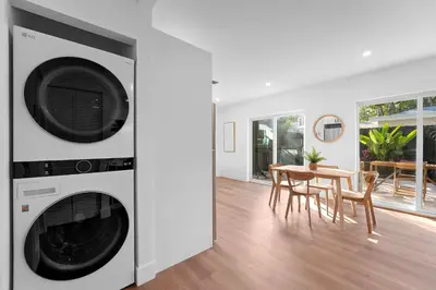 a kitchen with a washer and dryer in a room at 921 Apartment 2 in Fort Lauderdale
