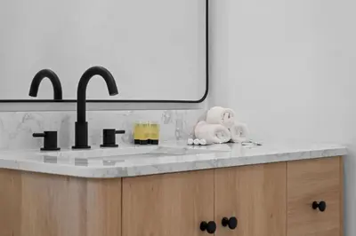 a bathroom counter with a sink and a mirror at 921 Apartment 3 in Fort Lauderdale