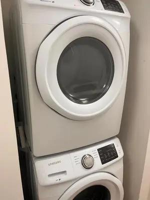 a washing machine and a dryer in a room at Two private rooms with private bathroom in shared House in Fort Lauderdale