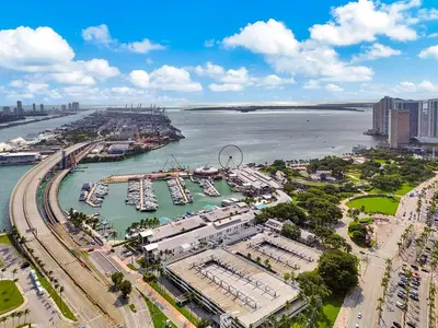 an aerial view of a harbor with boats in the water at Stylish One Bedroom in the heart of vibrant Downtown- Daily resort fee and parking not included in Miami