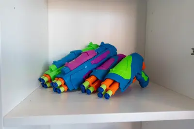 a group of toys sitting on a shelf at Yellow Door Oasis airport, cruise port and beach close-by in Fort Lauderdale