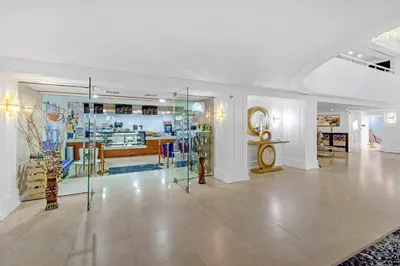 a room with a store with a clock in it at Huge Beachfront 2400sqft 5 Bedroom 5 Bathroom with Ocean View in Miami Beach