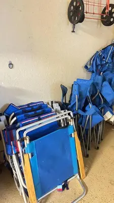 a group of blue chairs in a room at 3-BR space in charming Hollywood in Hollywood