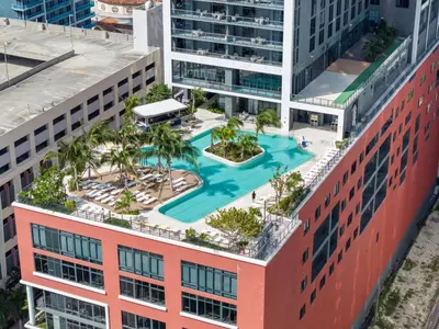 an aerial view of a building with a swimming pool at Suite at downtown Miami residences - Great view 30th floor in Miami