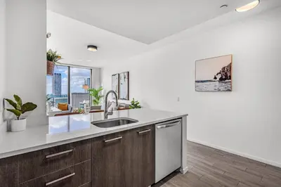 a kitchen with a sink and a window at Experience Miami Modern 2 Bed Near Biscayne Blvd in Miami