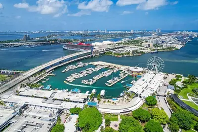 an aerial view of a marina with boats in the water at Experience Miami Modern 2 Bed Near Biscayne Blvd in Miami