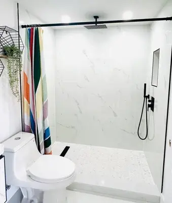 a white bathroom with a toilet and a shower at Chic Comfortable Boutique Stay in Miami