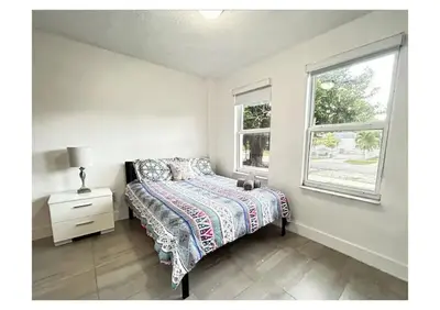 a bedroom with a bed and a window at 2bed Stay in the Heart of Miami in Miami