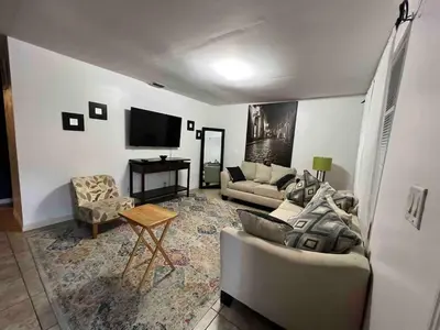 a living room with two couches and a television at Known for its beaches & walk to downtown Hollywood Bliss 3 in Hollywood
