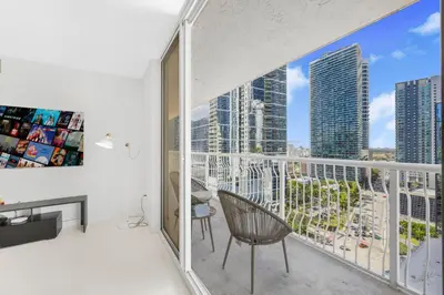 an apartment balcony with a view of a city at Modern Brickell Condo with Prime City Views in Miami
