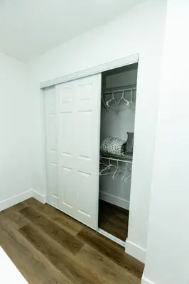 a closet with a white door in a room at Your Perfect Oasis in Miami! in Miami