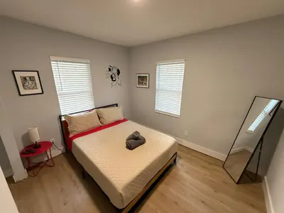 a bedroom with a bed with a hat on it at Perfect Central Stay in Miami