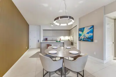a dining room with a table and chairs at Condo Closer The Sea and Beatiful Views in Hollywood