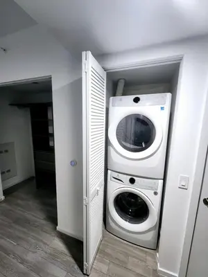 a washer and dryer in a room at Miami Myami Miamí Studio Apartment with Balcony in Miami