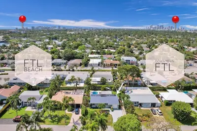 an aerial view of the resort with the city in the background at The Zen Den - Heated pool - One mile to heart of The Drive in Fort Lauderdale