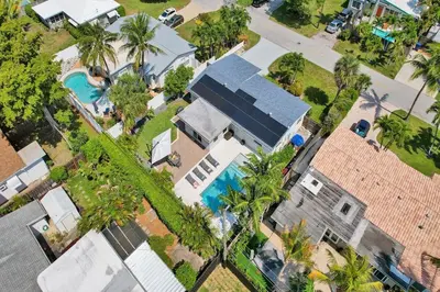 an overhead view of a house with a swimming pool at The Zen Den - Heated pool - One mile to heart of The Drive in Fort Lauderdale