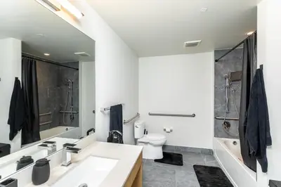a bathroom with a sink and a toilet and a shower at The Chill Spot in Miami