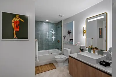a bathroom with a sink and a toilet and a tub at 37th Floor - 1bdrm Unt amazing View at Downtown Miami in Miami