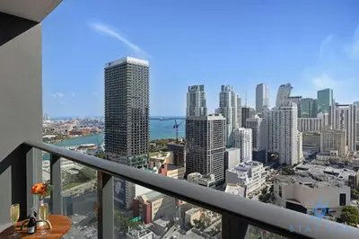a view of a city from the balcony of a building at Oasis Studio with Gym & Pool in Miami