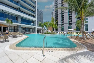 a swimming pool in the middle of a building at Great Studio Pool Gym & Views in Miami