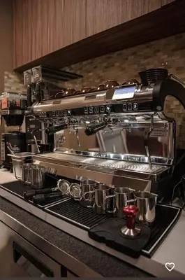 a coffee machine sitting on top of a counter at Luxury Ocean Reserve Condo Pool, Gym & Beach Access in Sunny Isles Beach