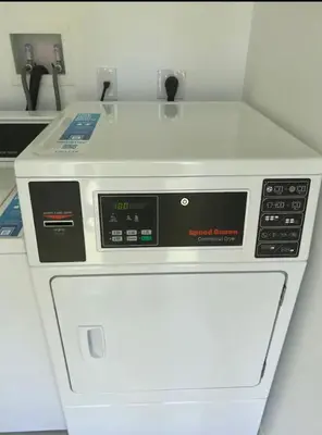a white stove top oven sitting in a room at Modern in heart of Hollywood in Hollywood