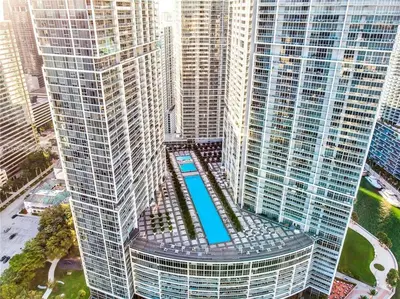 an overhead view of a large building with a pool in it at Incredible Ocean View 1BR 1BA Icon Brickell in Miami