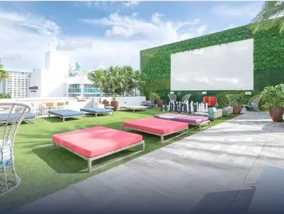 a group of benches on the roof of a building at Stunning High-Floor City View 1BR Hyde Beach House in Hollywood