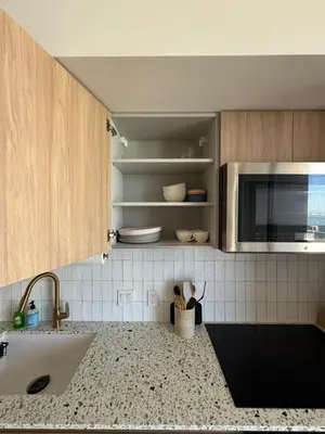 a kitchen with a sink and a microwave at Stunning Lux 2 Bed 2 Bath with Panoramic View from Balcony in Miami