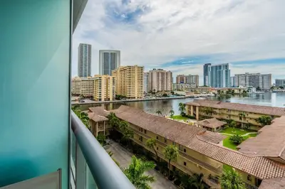 a view of the city from a balcony of a building at 2BR & 2BA Oasis at Beachwalk in Hallandale Beach
