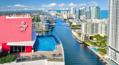 a view of a river in a city with buildings at 1 Bedroom w Kitchen on Beachwalk Beach &Pool &Gym in Hallandale Beach