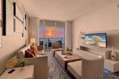 a living room with a couch and a table at Cozy Apartment with Balcony in Hollywood