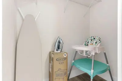 a room with a chair and a box of cereal at Charming 4BR Oasis with Saltwater Pool and Parking in North Miami