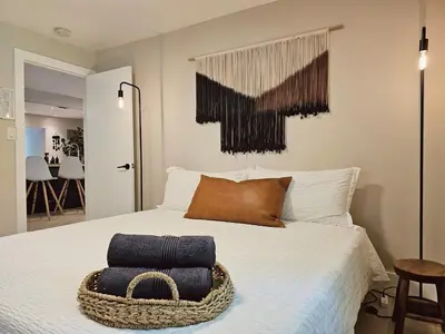 a bedroom with a bed with a basket on it at Casa Eden - Half mile to Lauderdale Marine Center - 4 bedrooms - 2 bathrooms in Fort Lauderdale